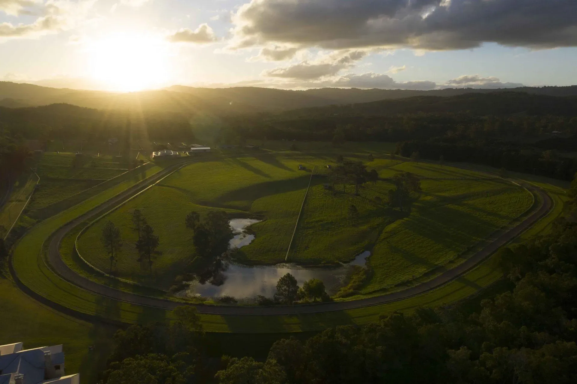 Peachester Lodge and its training track at sunset